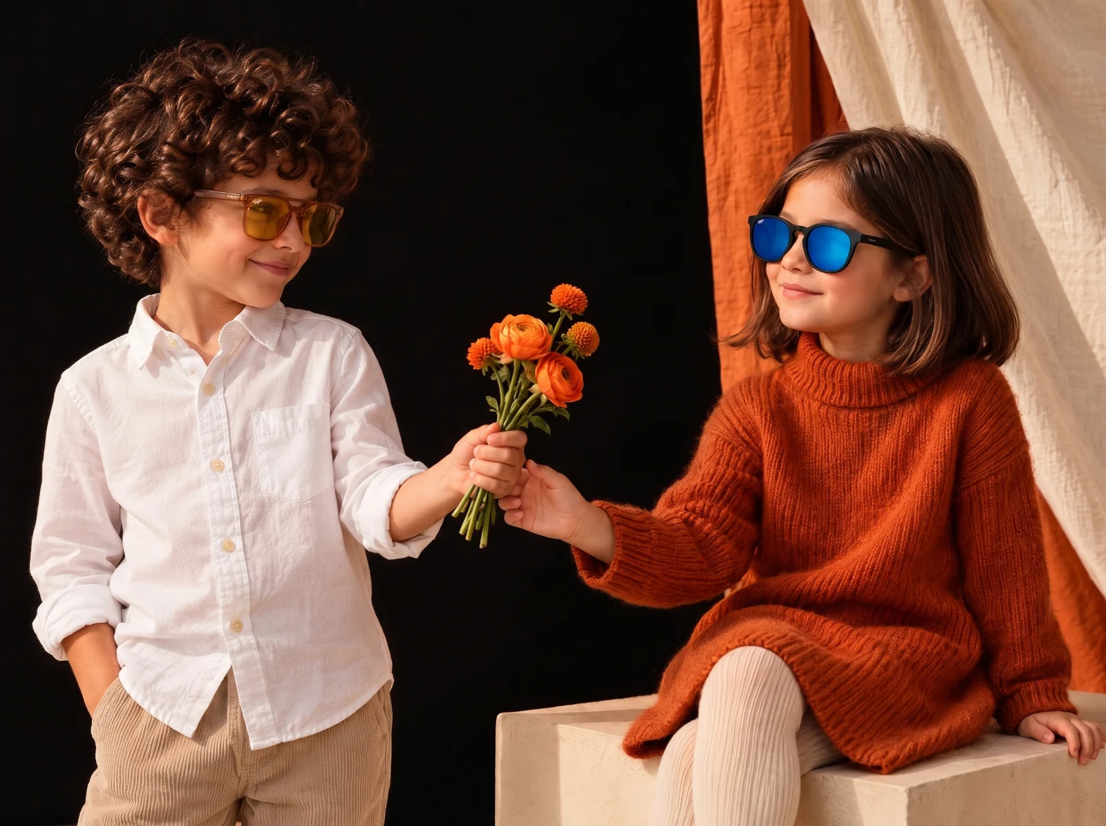 A boy and a girl wearing VEGAS kids sunglasses